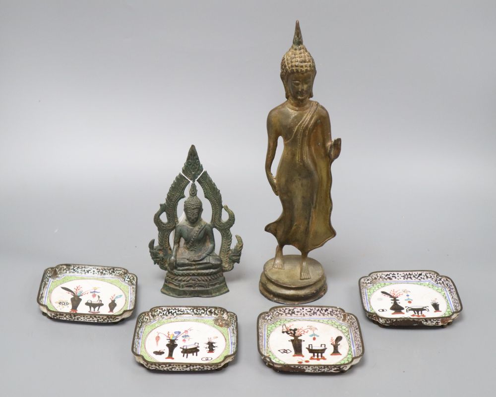 A 19th century bronze Thai standing figure, a Thai bronze seated figure and four Canton enamel dishes